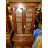 A 19TH CENTURY MAHOGANY GLAZED FLOORSTANDING BOOKCASE OF SLIM PROPORTIONS, the glazed, twin door