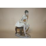 A LARGE SEATED NAO BALLERINA FIGURE