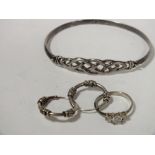 A STERLING SILVER BANGLE TOGETHER WITH A G EM SET SILVER RING AND A PAIR OF EARRINGS, APPROX TOTAL