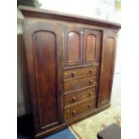 A VICTORIAN MAHOGANY COMPACTUM WARDROBE A/F H- 195 W-195 CM VENEER LOSSES, CORNICE DAMAGED ETC