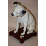 A REPRODUCTION RESIN HMV DOG FIGURE ON PLINTH