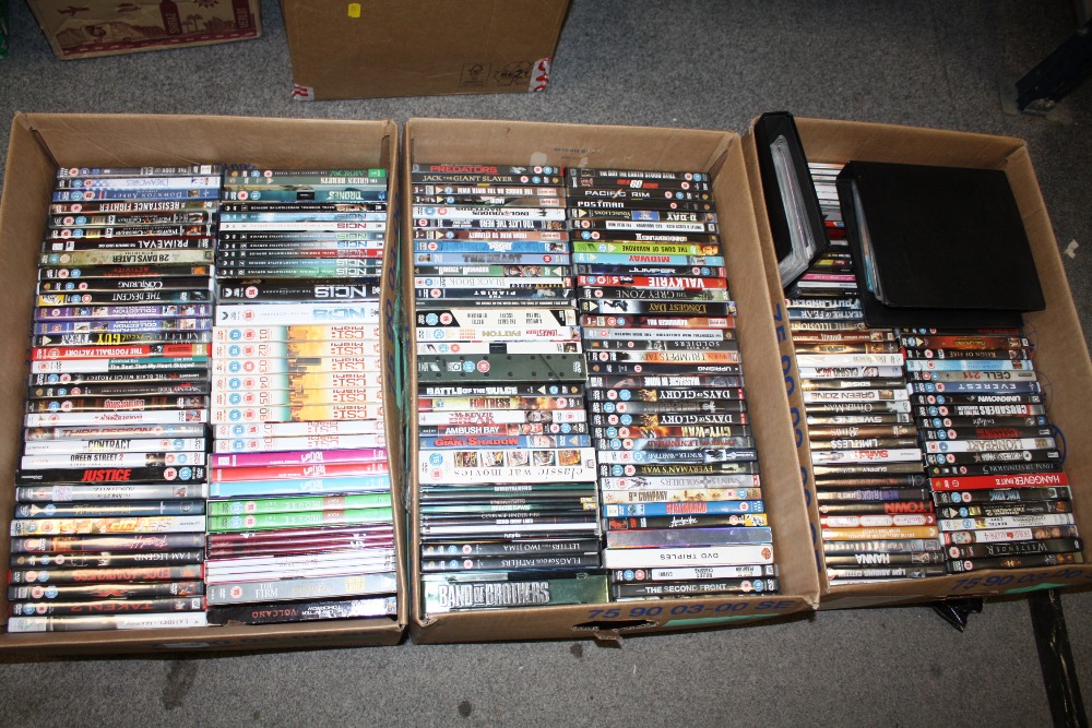 THREE TRAYS OF DVDS