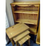 A SMALL HONEY PINE OPEN BOOKCASE H-104 W-76 CM AND A NEST OF TABLES (2)
