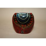 A SMALL ANITA HARRIS PURSE VASE