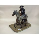 A VINTAGE CAST METAL FIGURE OF NAPOLEON ON HORSEBACK