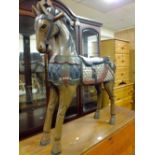 AN UNUSUAL CARVED AND PAINTED EASTERN WOODEN HORSE H-92 CM