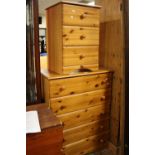 A HONEY PINE CHEST OF DRAWERS AND A BEDSIDE CHEST (2)