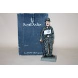 A ROYAL DOULTON LIMITED EDITION CHARLIE CHAPLIN FIGURE HN2771