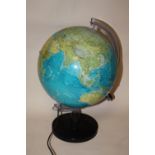 A MODERN ILLUMINATING DESK GLOBE