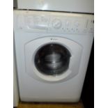 A HOTPOINT AQUARIUS WASHER AND DRYER