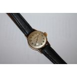 A LADIES 9CT GOLD CASED OMEGA WRISTWATCH