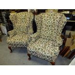 A PAIR OF VINTAGE PARKER KNOLL FLORAL ARMCHAIRS