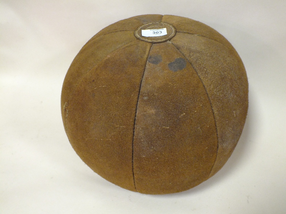 A VINTAGE LEATHER MEDICINE BALL