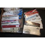A BOX OF FIRST DAY COVERS AND STAMPS
