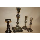 A PAIR OF SILVER PLATED CANDLESTICKS TOGETHER A LARGE EXAMPLE AND ANOTHER (4)
