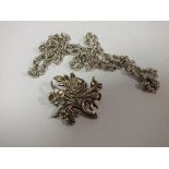 A STERLING SILVER CHAIN TOGETHER WITH A HALLMARKED SILVER FLORAL BROOCH, APPROX TOTAL WEIGHT 19.1G
