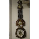A DECORATIVE WALL HANGING BAROMETER IN THE SHAPE OF A MUSICAL INSTRUMENT