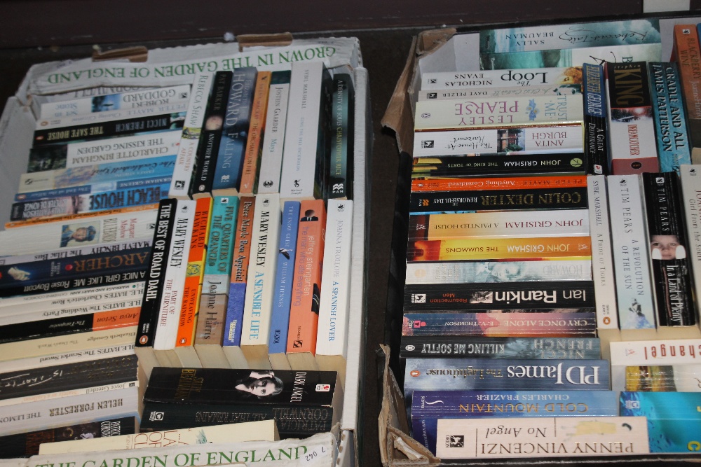 FOUR TRAYS OF PAPERBACK NOVELS