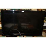 A 32" SAMSUNG FLATSCREEN TV