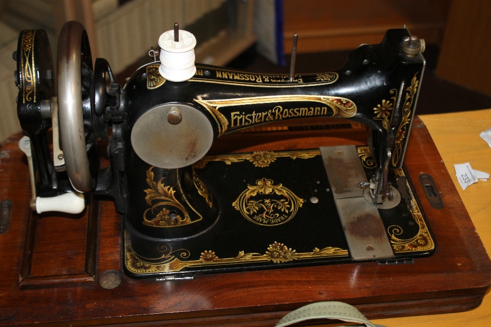 A FRISTER AND ROTHMAN CASED SEWING MACHINE