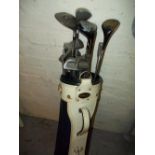 A SET OF VINTAGE GOLF CLUBS