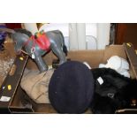 A BOX OF MILITARY ITEMS TO INCLUDE A RUSSIAN STYLE HAT AND A LEATHER DONKEY