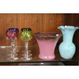 A COLLECTION OF COLOURED DRINKING GLASSES AND TWO COLOURED GLASS VASES