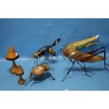 A COLLECTION OF WOOD AND METAL INSECTS TO INCLUDE A GRASSHOPPER, WASP, BEETLE ETC.