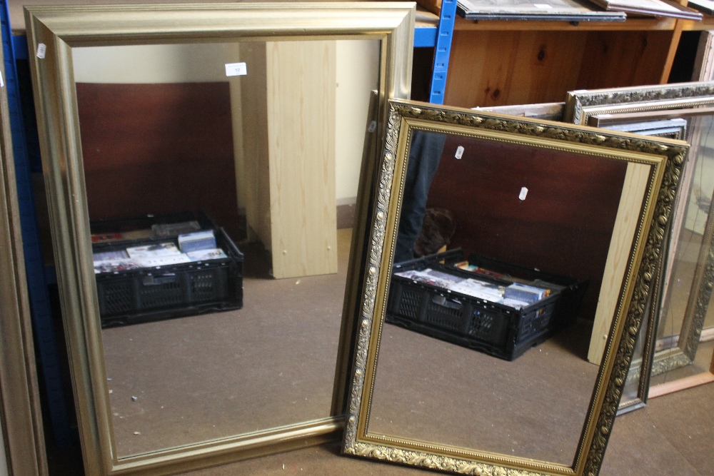 A GILT FRAMED MIRROR TOGETHER WITH ANOTHER, THE LARGEST 105 X 75 CM (2)