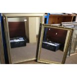 A GILT FRAMED MIRROR TOGETHER WITH ANOTHER, THE LARGEST 105 X 75 CM (2)