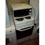A ROYALE MICROWAVE PLUS A BEKO ELECTRIC OVEN