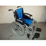 AN EXCEL VANOS FOLDING SELF PROPELLED WHEELCHAIR