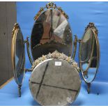 A CIRCULAR FRAMED FLORAL MIRROR TOGETHER WITH A DRESSING TABLE MIRROR