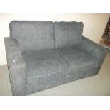 A FABRIC TWO SEATER SOFA