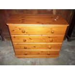 A SOLID PINE FOUR DRAW CHEST