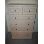 A 2 OVER 4 MODERN ALSTONS CHEST OF DRAWERS IN PINE EFFECT