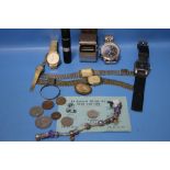 A COLLECTION OF WRIST WATCHES, SMALL QUANTITY OF COINS, SILVER CHARM BRACELET ETC.