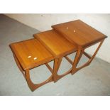 A RETRO NEST OF THREE TABLES