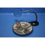 AN ORIENTAL PLATE A/F TOGETHER WITH AN ANGLE POISE MAGNIFYING LENS