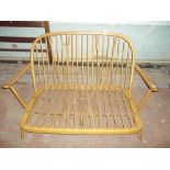 AN ERCOL TWO SEATER SOFA FRAME