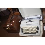 A SCHEIDEGGER TYPOMATIC TMS TYPEWRITER MADE IN WESTERN GERMANY TOGETHER WITH A JONES BOOT POLISH