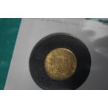 A VICTORIAN 1854 SHIELD BACK SOVEREIGN IN ROYAL MINT COLLECTORS SERVICES PACKET.