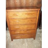 A WIDE TALL FIVE DRAWER CHEST IN MEDIEVAL OAK