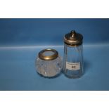 A HALLMARKED SILVER AND CUT GLASS MATCHSTRIKER AND SILVER TOPPED SUGAR SIFTER (2)