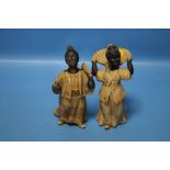 A PAIR OF 19TH CENTURY ORIENTAL STYLE NODDING FIGURES OF A LADY AND A GENTLEMAN