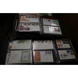 A QUANTITY OF FIRST DAY COVERS LOOSE AND IN ALBUMS