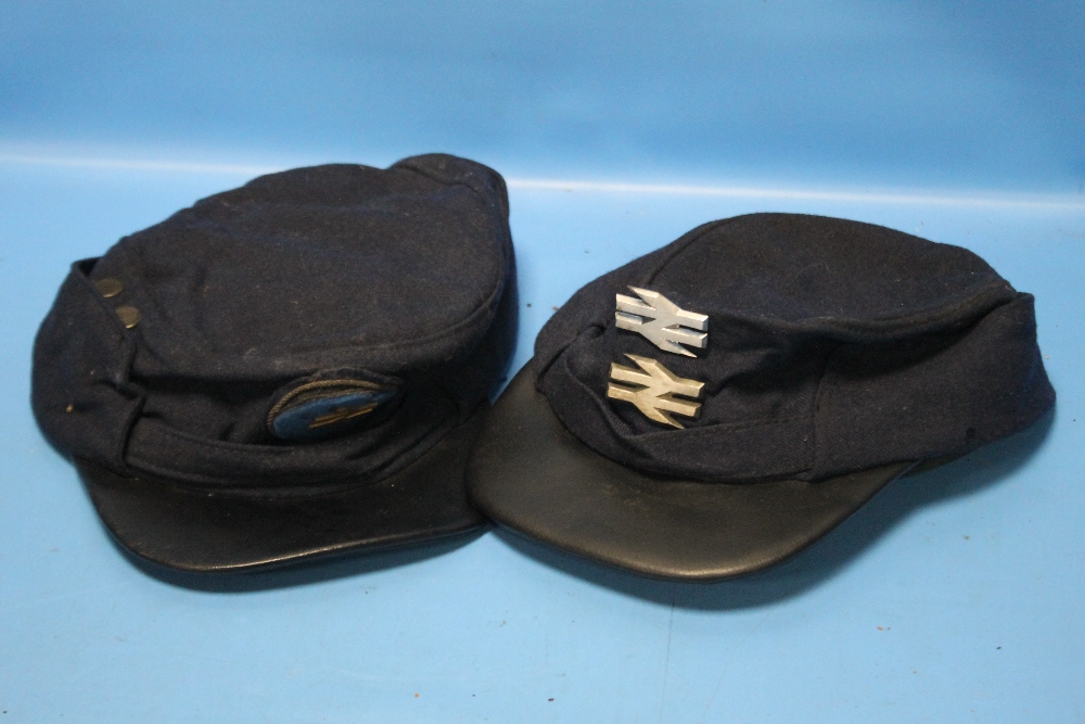 TWO VINTAGE RAILWAY GUARDS CAPS