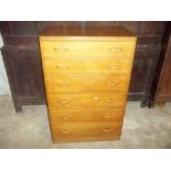 AN OAK SIX DRAW VINTAGE CHEST OF DRAWS