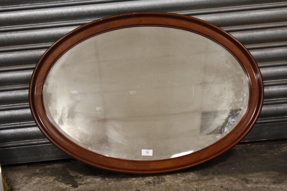 A MAHOGANY FRAMED BEVEL EDGED HANGING WALL MIRROR, W 85 CM