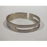 A WHITE METAL BANGLE